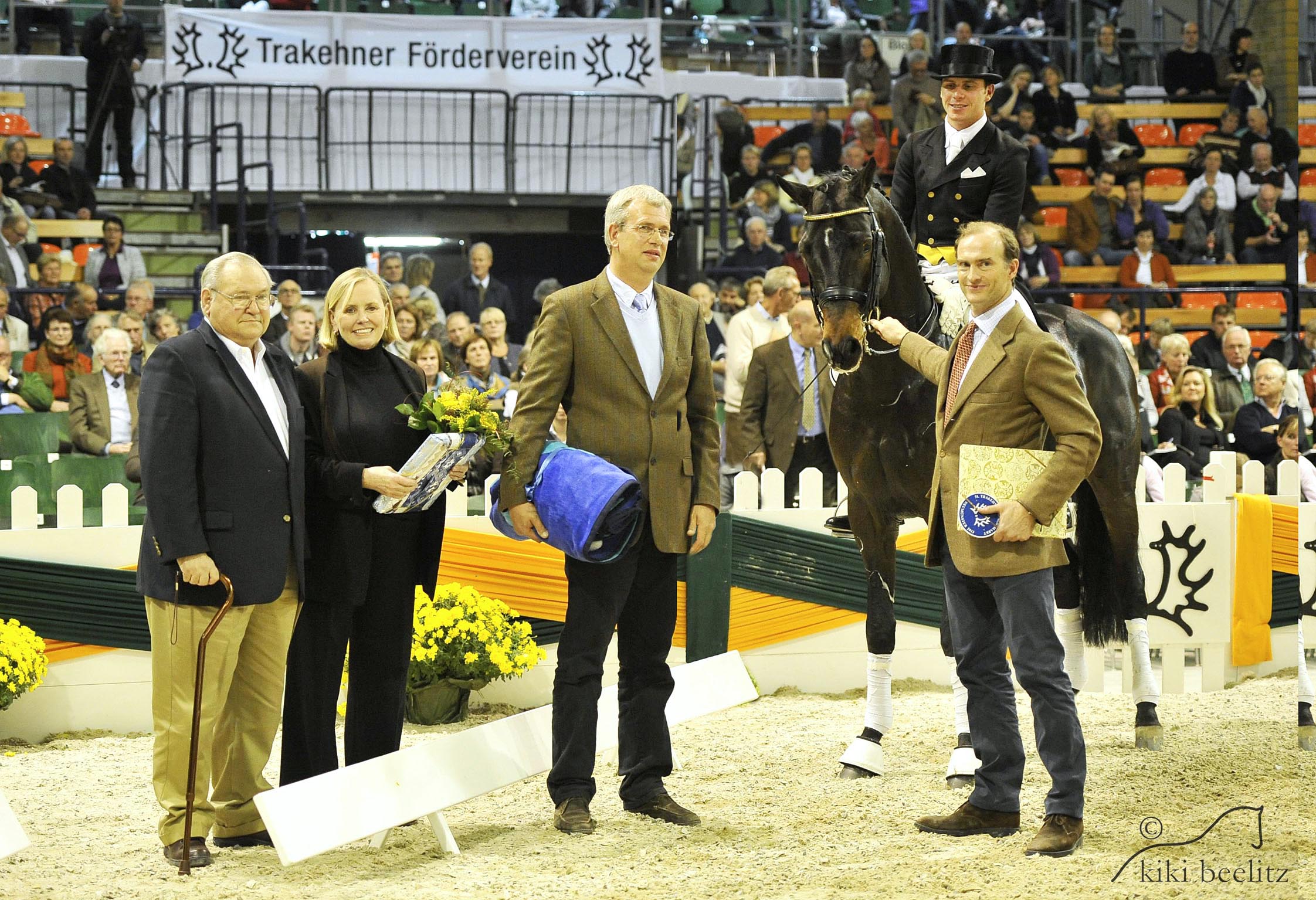 Herzensdieb, pictured with Doug and Louise Leatherdale, Jens Meyer and Prince Donatus Von Hessen, receives the Elite title from the Trakehner Verband